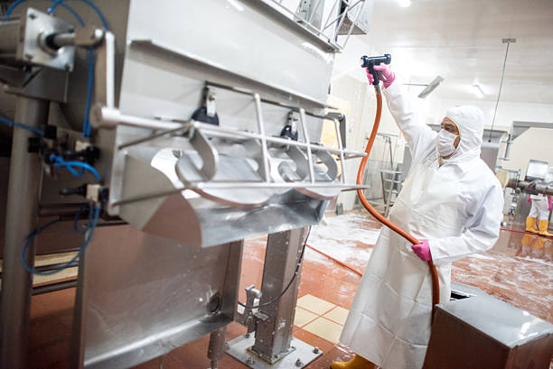 cleaning service - washing machines at a factory